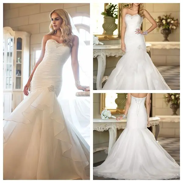 Diamante Encrusted Sweetheart Neckline Ruched Bodice And Drop Hip Diamante Encrusted Sweetheart Neckline Ruched Bodice And Drop Hip Brooch Accent Mermaid Wedding Dress With