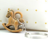

Imitation mahogany cute little wooden horse key ring can get beautiful key chain wholesale