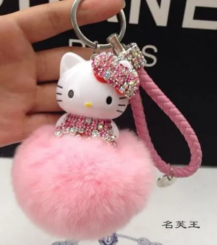 

New Hello Kitty colorful Bells crystal Real Rabbit Fur Pompom Car leather metal Key chain Keychain Women bag pendant Accessories
