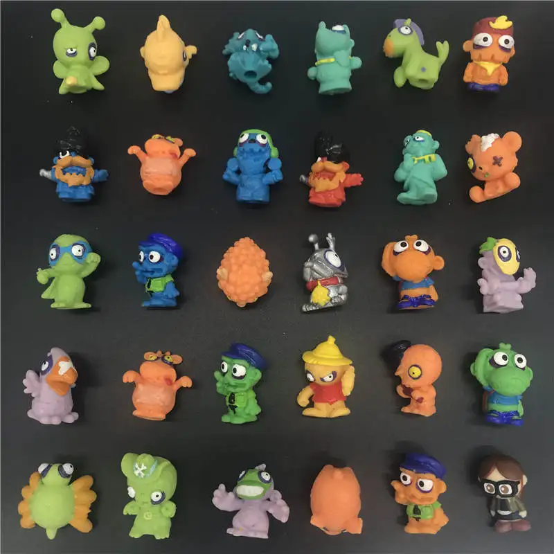

10Pcs/lot Zomlings Superzings Anime Trash Dolls Action Figures Rubber monster Toy children Playing Animal Garbage Doll Gift