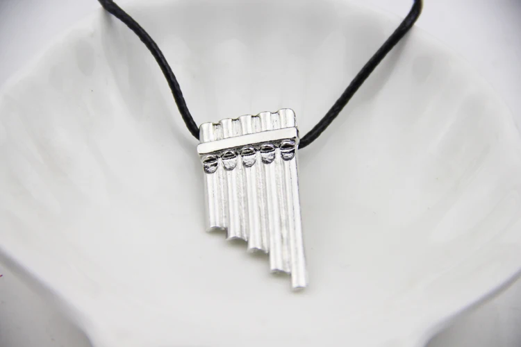 

Fashion Jewelry Silver Charm Peter Pan Magic Flute Pendant Necklace For Men And Women