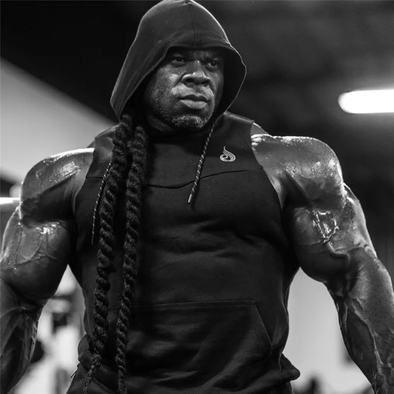 Bodybuilder in a Hood in the Gym