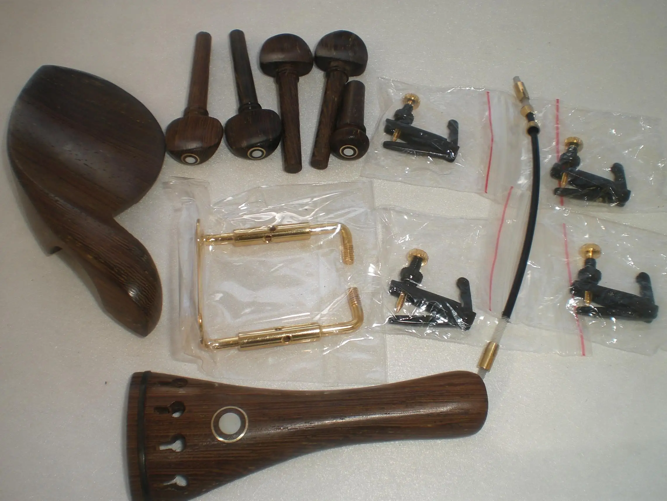 

1 Set Wenge Wood Violin Parts with Fiddle String Adjusters & Gold Color Chin Rest Clamp & Nylon Tail Gut 1/4