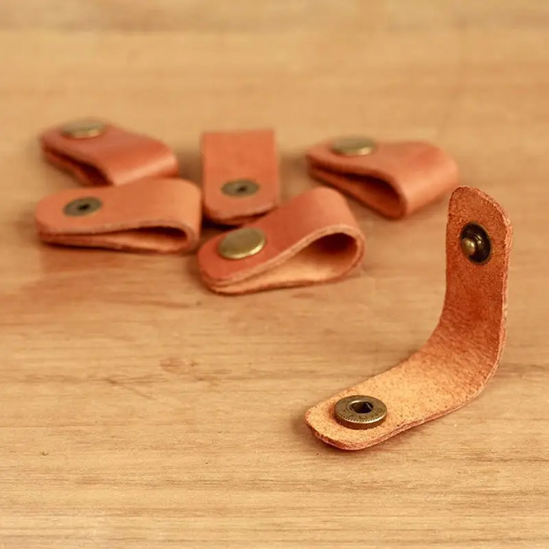 

100PCS Small Genuine leather Storage Buckle For Mobile/Iphone Earphones Charger Data Line Cable Winder Ties LAN Customised