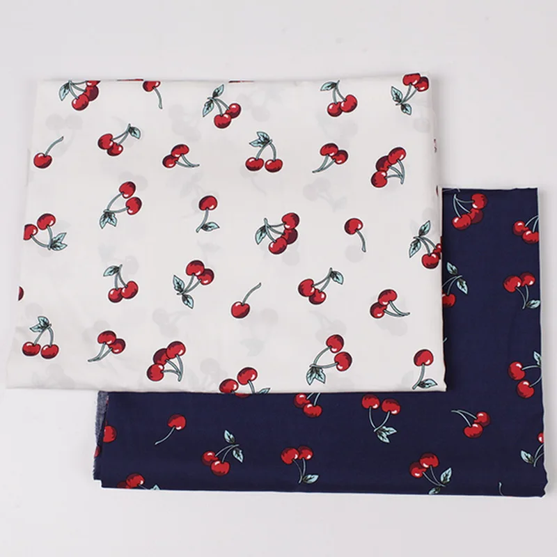 

Full cotton plain poplin printed white/blue bottom cherries fabric