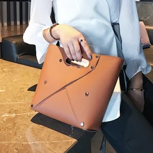 2019 New European American Simple Hollow Rivet Bucket Bag Shoulder Bag luxury handbags women bags designer 2019 New European American Simple Hollow Rivet Bucket Bag Shoulder Bag luxury handbags women bags designer