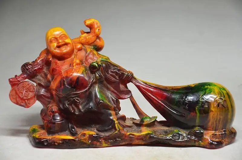

DELICATE CHINESE AMBER HAND CARVED BRING M0NEY FORTUNE STATUE good