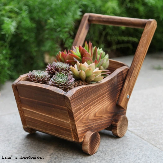

simple design wood tone vintage hand crafted small wooden cart planter
