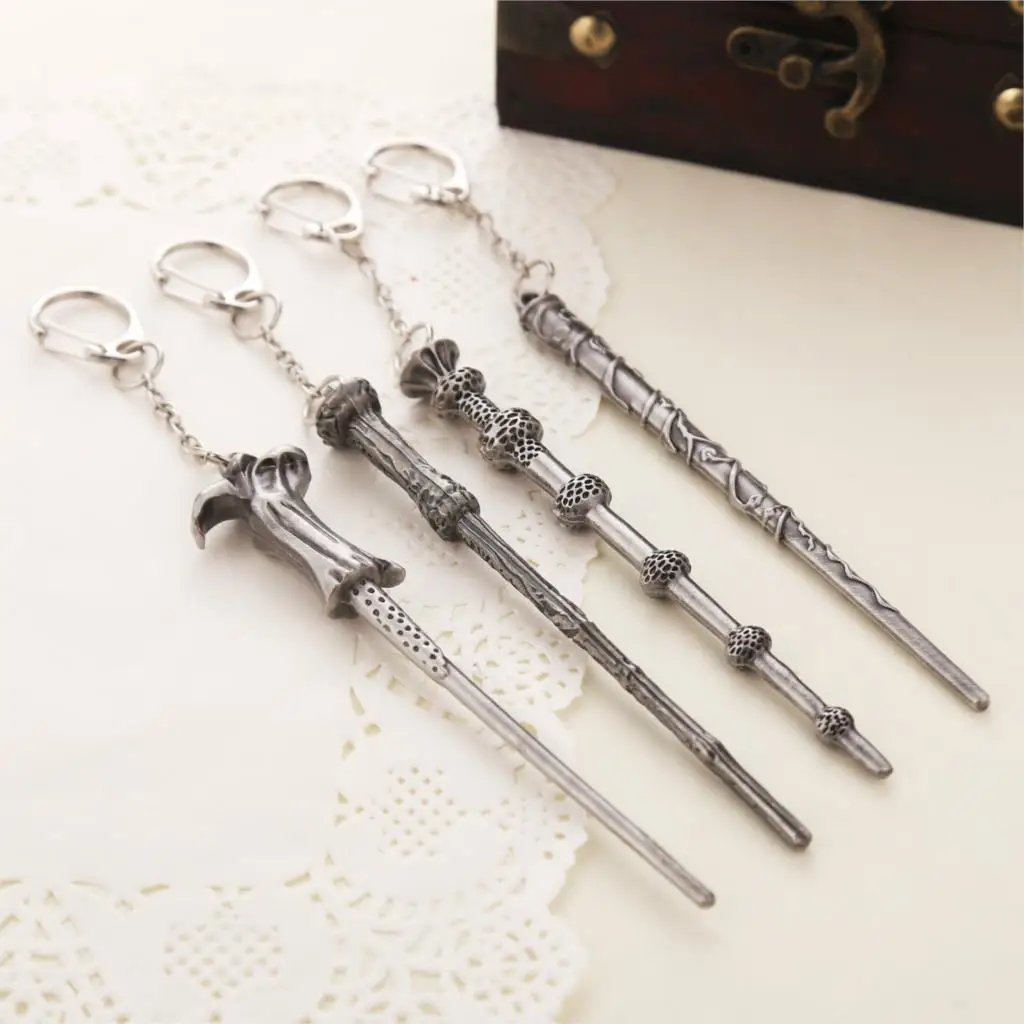 

Harri Potter Magic Wand Hogwarts School Gryffindor Slytherin Ravenclaw Hufflepuff Symbol Metal Pendant Keychain Keyring Jewelry