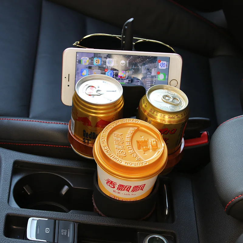 

Multi - functional magic car within the water cup holder car drinks rack