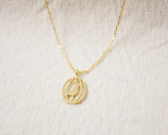 Gold Silver Bird In The Cage Necklace.jpg