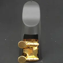 Совершенство Alto sax Лигатура и колпачок применяются к бакелит мундштук