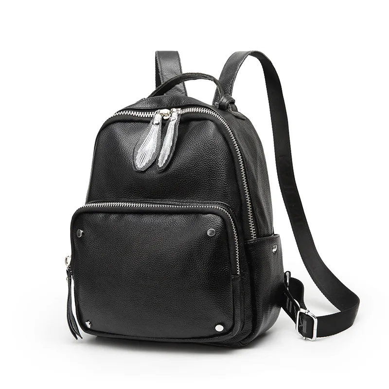

New Fashion Black Genuine Leather backpack women Rivets Sewing Decoration Travel Backpack Large capacity Schoolbag