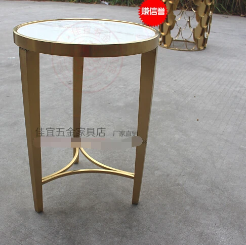 Stainless steel small round tea table.