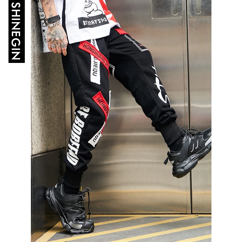 SHINEGIN Streetwear Stitching Color Joggers Hip Hop Pants Men Elastic Waist Cargo Pants Tapered Pants Pantalon Homme 072W SHINEGIN Streetwear Stitching Color Joggers Hip Hop Pants Men Elastic Waist Cargo Pants Tapered Pants Pantalon Homme 072W