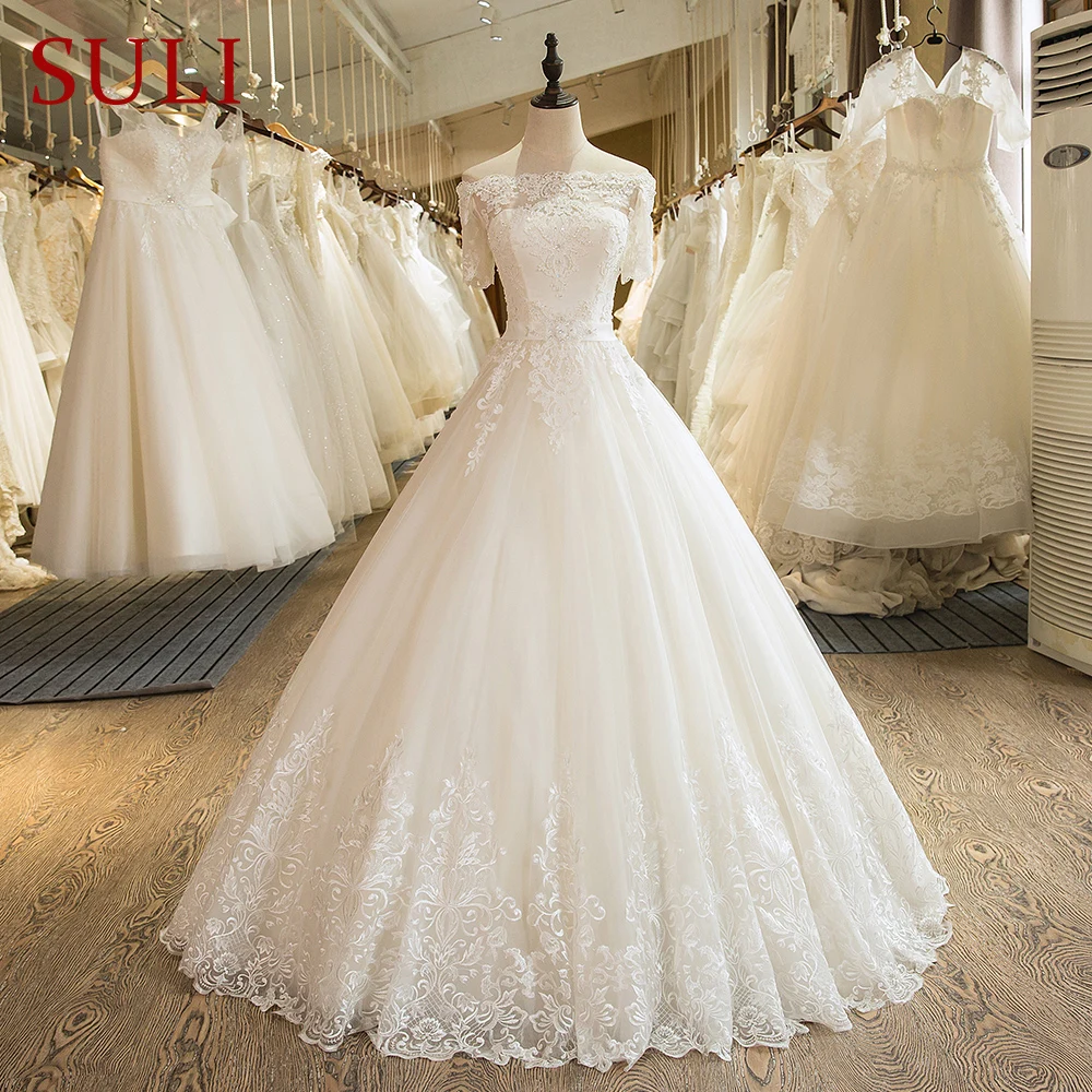 SL 5 Charming A Line Short Sleeve Tulle Lace Appliques Vintage Boho Wedding Dress 2017