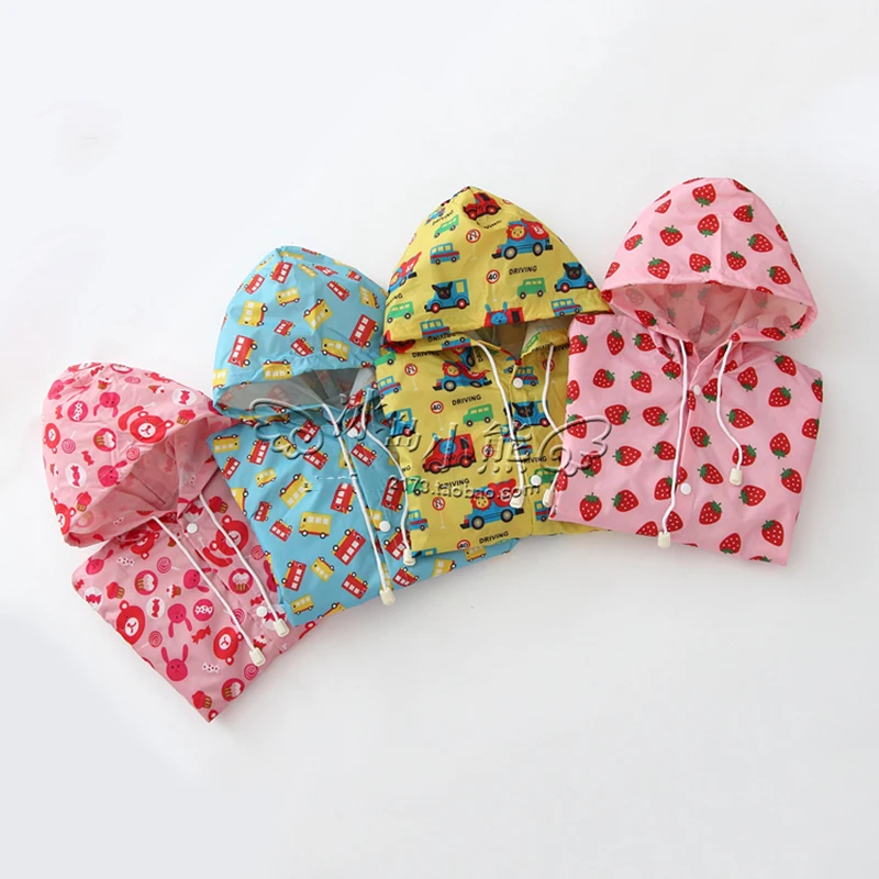 

Free shiping Children car raincoat poncho with sleeves cute cartoon boys and girls students cap rainweaar, school bags position