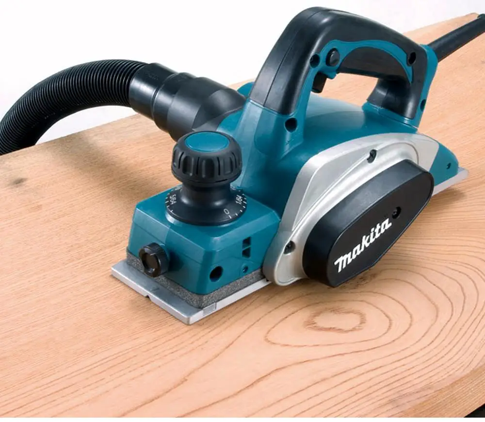 Makita KP0800X 620 Вт ширина строгания: 82 мм(3-1/") глубина: 2,5 мм(3/32") 17000 об/мин ручной Электрический строгальный станок