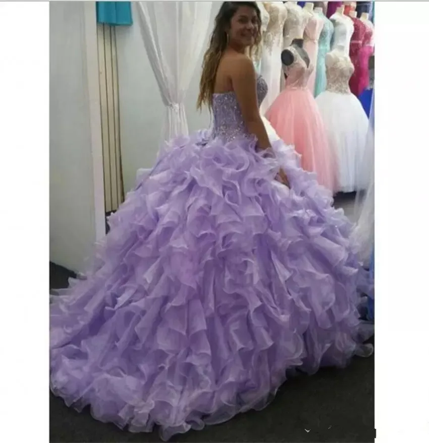 online-lavender-sweet-16-quinceanera-dresses-with-luxury-crystals-beaded-ruffles-organza-ball-gown-prom-dresses-formal-wear.webp (2)_