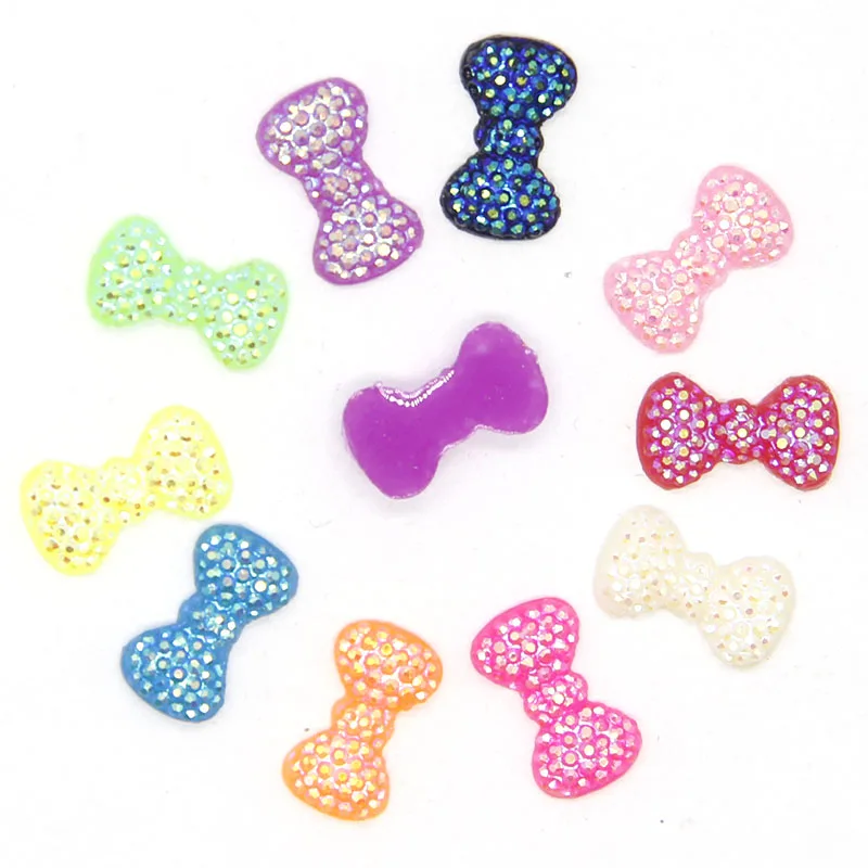 

Hot Sale 40PCS Random Mixed AB Color Resin 12*7MM Resin Bow Flatback Crafts Appliques/ DIY Crafts High Quantity