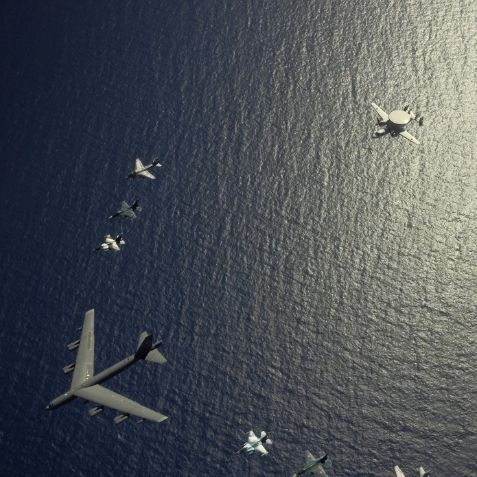 A U.S. Air Force B-52 Stratofortress aircraft leads a formation of aircraft Poster Print (11 x 17)