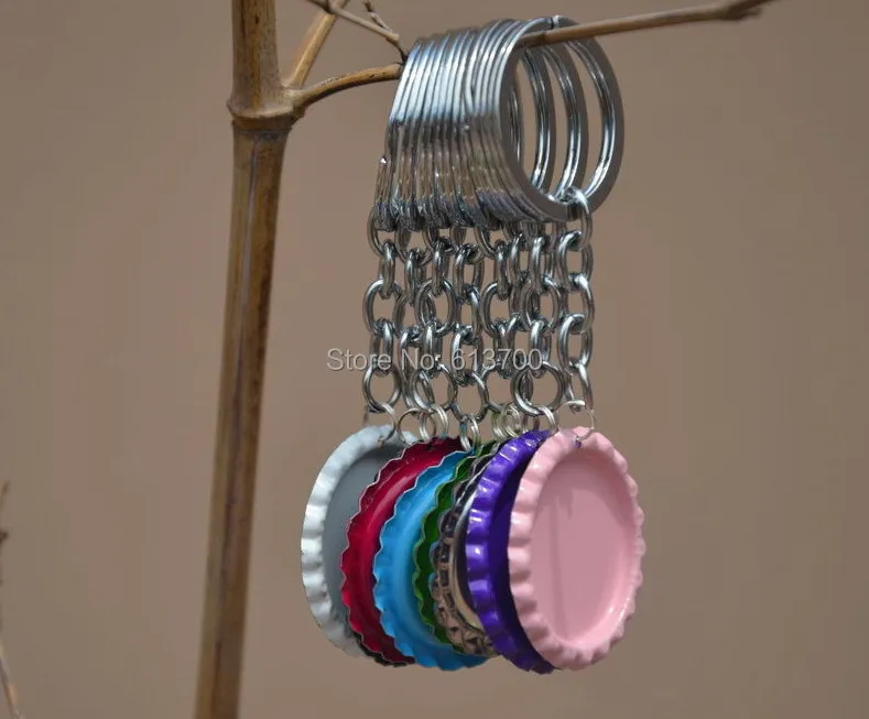 

Mixed Order 600 pcs/lot : 300 Pcs Both Side Colored Flattened Bottle caps Flat bottlecaps+300 pcs Key Chains For Jewelry Craft