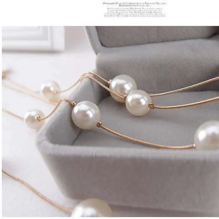 Korean version of the multi-layer fashion double-layer pearl sweater chain long decorative necklace