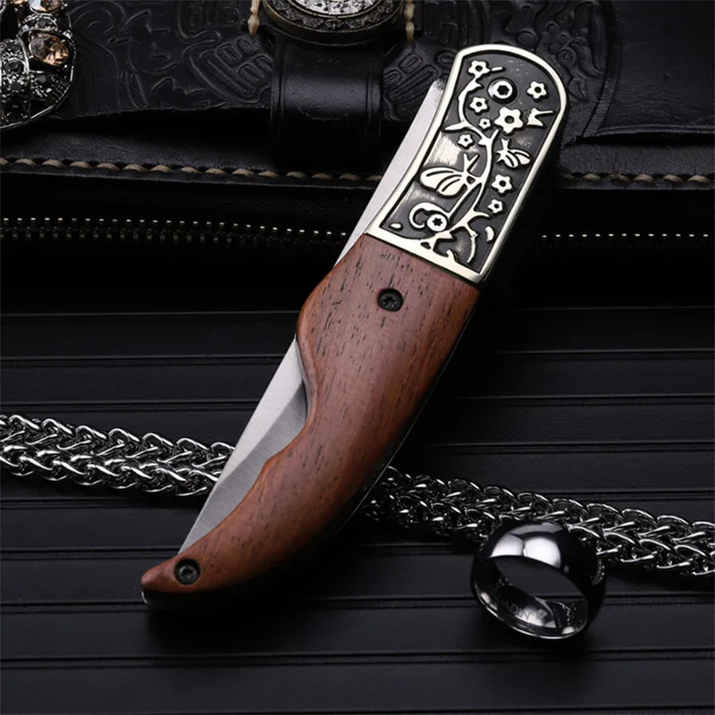 2016 high quality outdoor folding knife self-defense wilderness survival with high hardness knife wild fruit knife plum blossom
