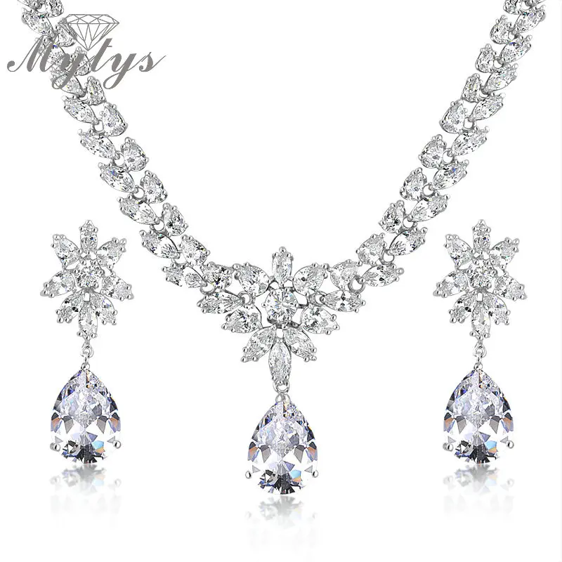 

Mytys High Quality Snow White Transparent Shining Crystal Jewelry Sets Crystal Pendant Necklace and Drop Earrings Sets CN156