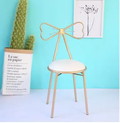 

Iron art bowknot web celebrity chair modern simple backrest princess dresser stool cosmetic chair manicure chair.
