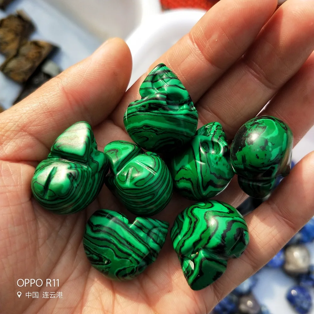 

Natural Beautiful Rose Quartz Skull And Artificial Malachite Skull