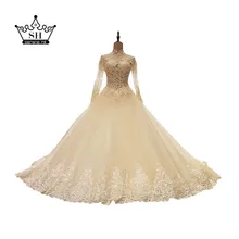 Sexy Sheer High Neck Tassels Wedding Dresses 2017 See Through Long Sleeve Beaded Sequins Backless Bridal Gowns Vestido De Noiva