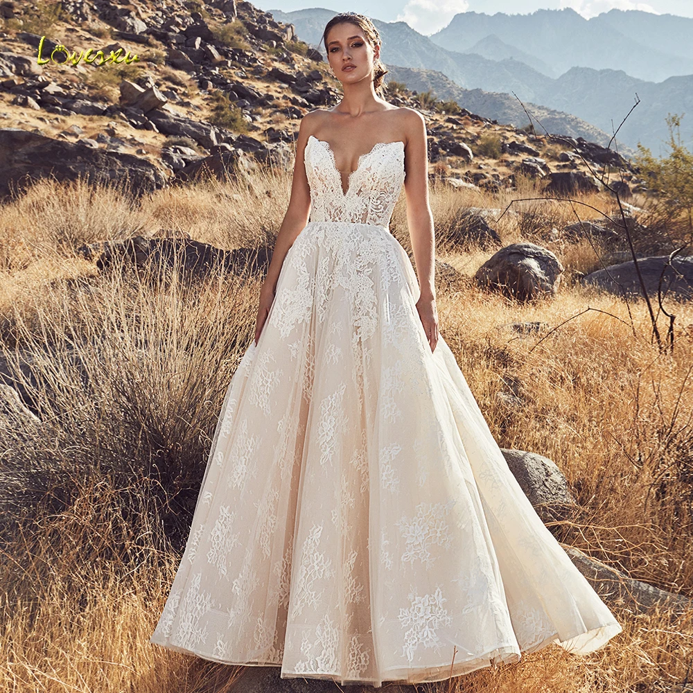 

Loverxu Sweetheart A Line Wedding Dress Delicate Applique Sleeveless Backless Bride Dress Court Train Lace Bridal Gown Plus Size
