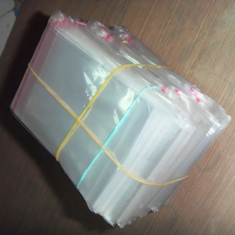 

Creative Hot selling 200Pcs/set Useful 6x11cm Clear Plastic Bags Self Adhesive Seal Jewelry Gift Package Opp Bag