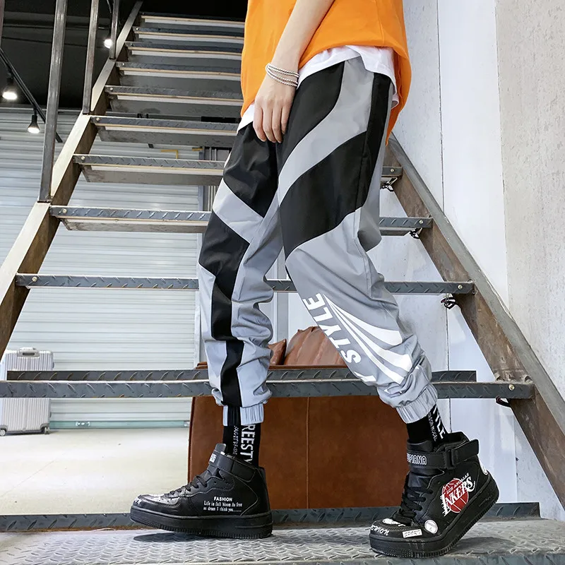 Comprar Riinr 2019 nuevo verano para hombres y mujeres pantalones de chándal Flash reflectantes Joggers Hip Hop Dance Show Party Night Jogger pantalones holgados
