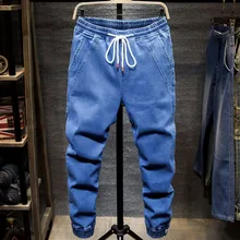 Весна Осень гарем джинсы для мужчин Свободные шнурок эластичный пояс сплайсинга ноги сплошной цвет повседневные мужские джинсы мода