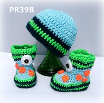

Crocheted one eyed infant boy or girl shoes boot and hat set