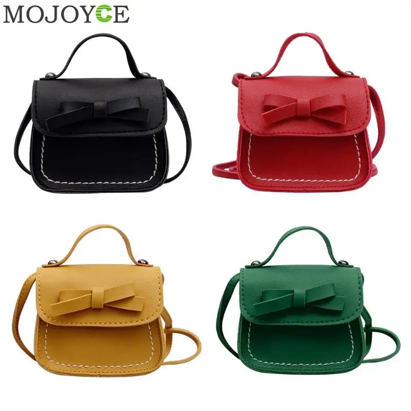 الأطفال الفتيات حقيبة ساعي لطيف Bowknot لون نقي حقائب الاطفال بو الجلود حقائب كتف البسيطة Crossbody حقيبة مخلب حقيبة يد
