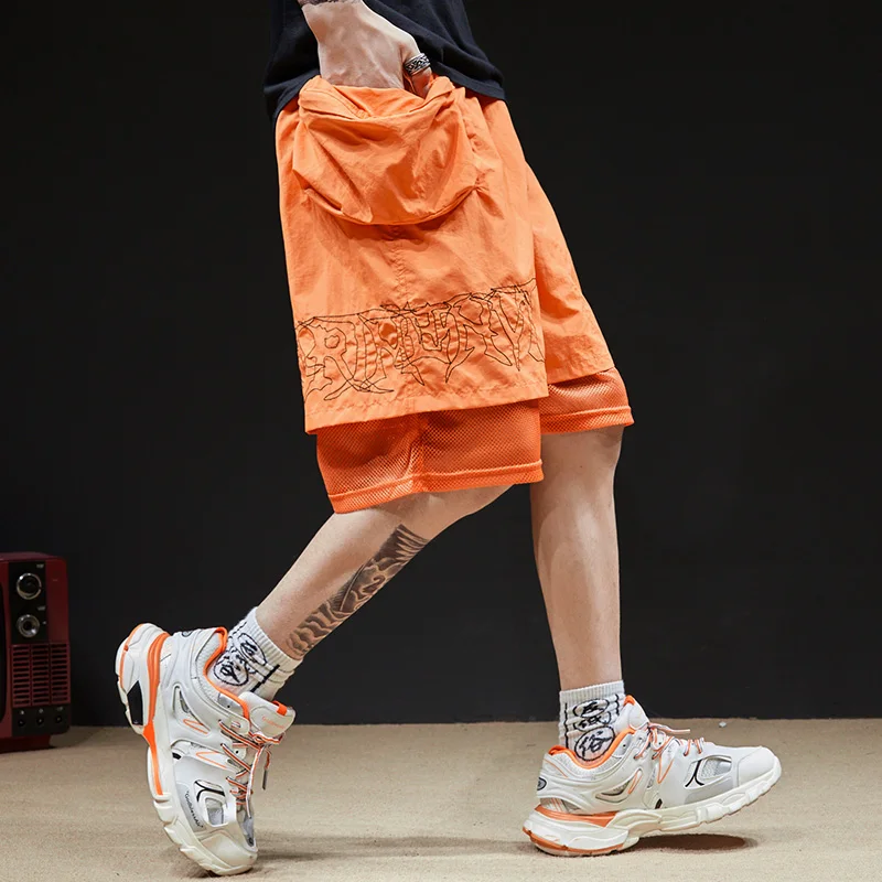 Американский уличный отдых два Мужчины ленивый стиль уличный танец свободные шорты паутина Пряжа Сращивание