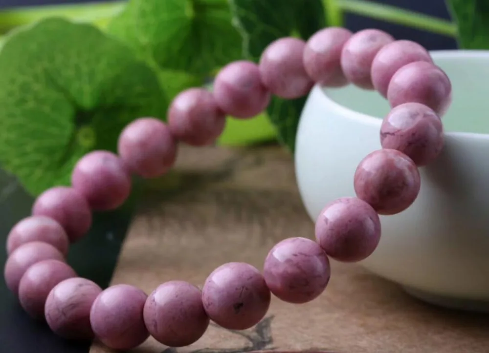 

Free shipping >>AAA NICE 100% Natural Rose Stone Crystal Bracelet