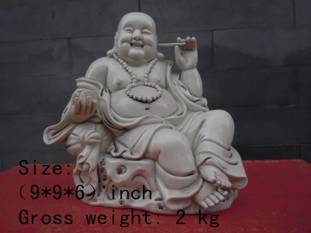 

Elaborate Chinese Dehua white porcelain laughing Buddha auspicious statue