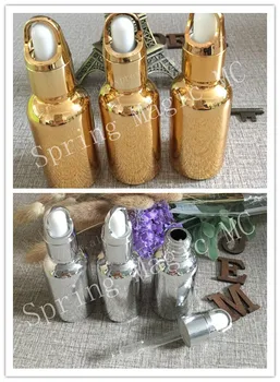 

30ml 100ml Golden / Silver glass dropper bottles essence oil bottles Vial Cosmetic Serum Packaging Refillable Perfume Bottles
