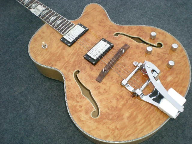 

Custom 6 string jazz electric guitar, double F hole hollow body, tree scar veneer, wood color, jazz large rocker string board..