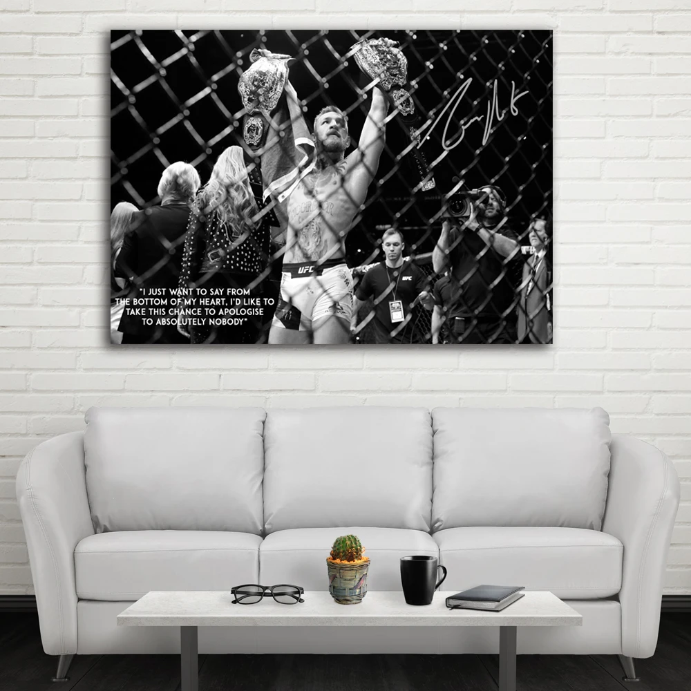 UFC Conor McGregor празднует с его двумя чемпионскими ремнями Настенная картина холст