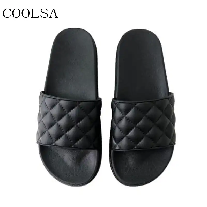 black flat slip on sandals
