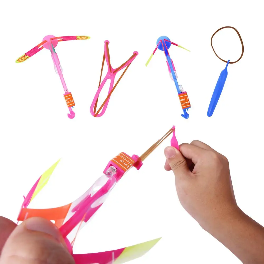 100 X Flying Toy For Kid Amazing LED Light Flash Copter Arrow Rocket