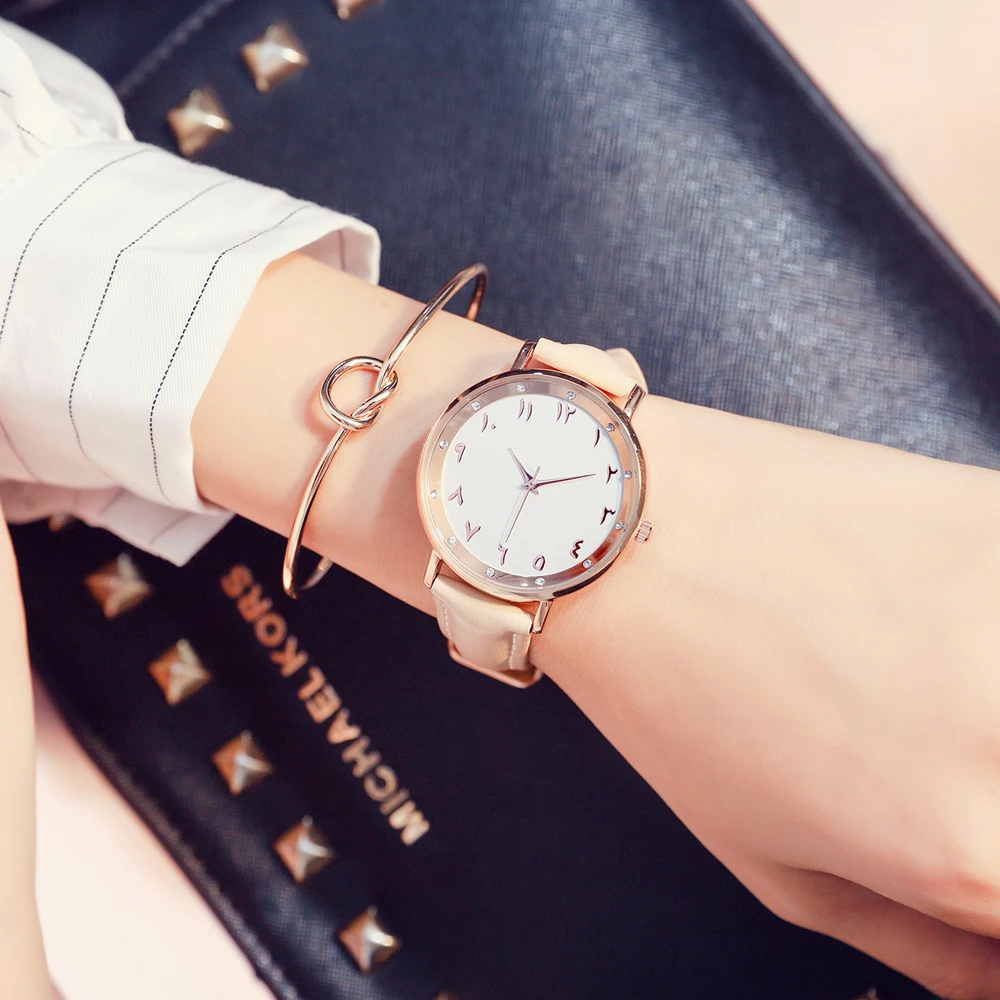 

kivo rose gold tone white watch urdu numbers