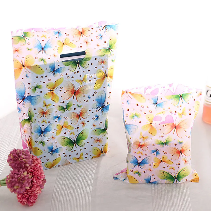 

100pcs 15x20cm Colorful Butterfly Plastic Gift Bag With Handles Small Jewelry Packaging Plastic Shopping Handle Pouches H023
