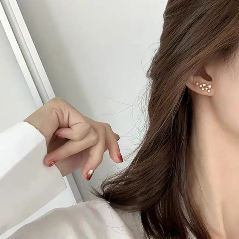 

HUANZHI 2019 New Chic S925 Zircon Rhinestone Irregular Four-Pointed Star Stud Earrings for Women Girl Party Travel Gift Jewelry