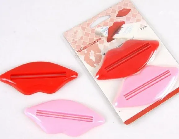 

New 2pcs/lot Multi-purpose Extrusion Creative Red Lips Toothpaste Squeeze Device Toothpaste Gels Cream Lotion Squeezer